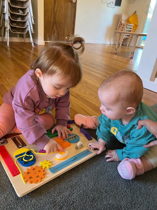  Children playing with learning toys